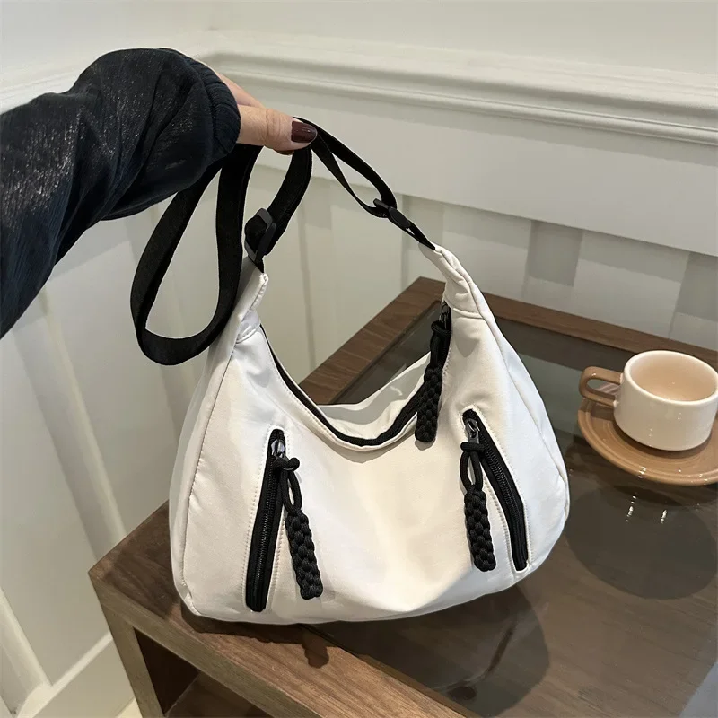 Simple casual bag trendy cool tooling style shoulder messenger bag large capacity couple tote bag
Simple casual bag trendy cool tooling style shoulder messenger bag large capacity couple tote bag