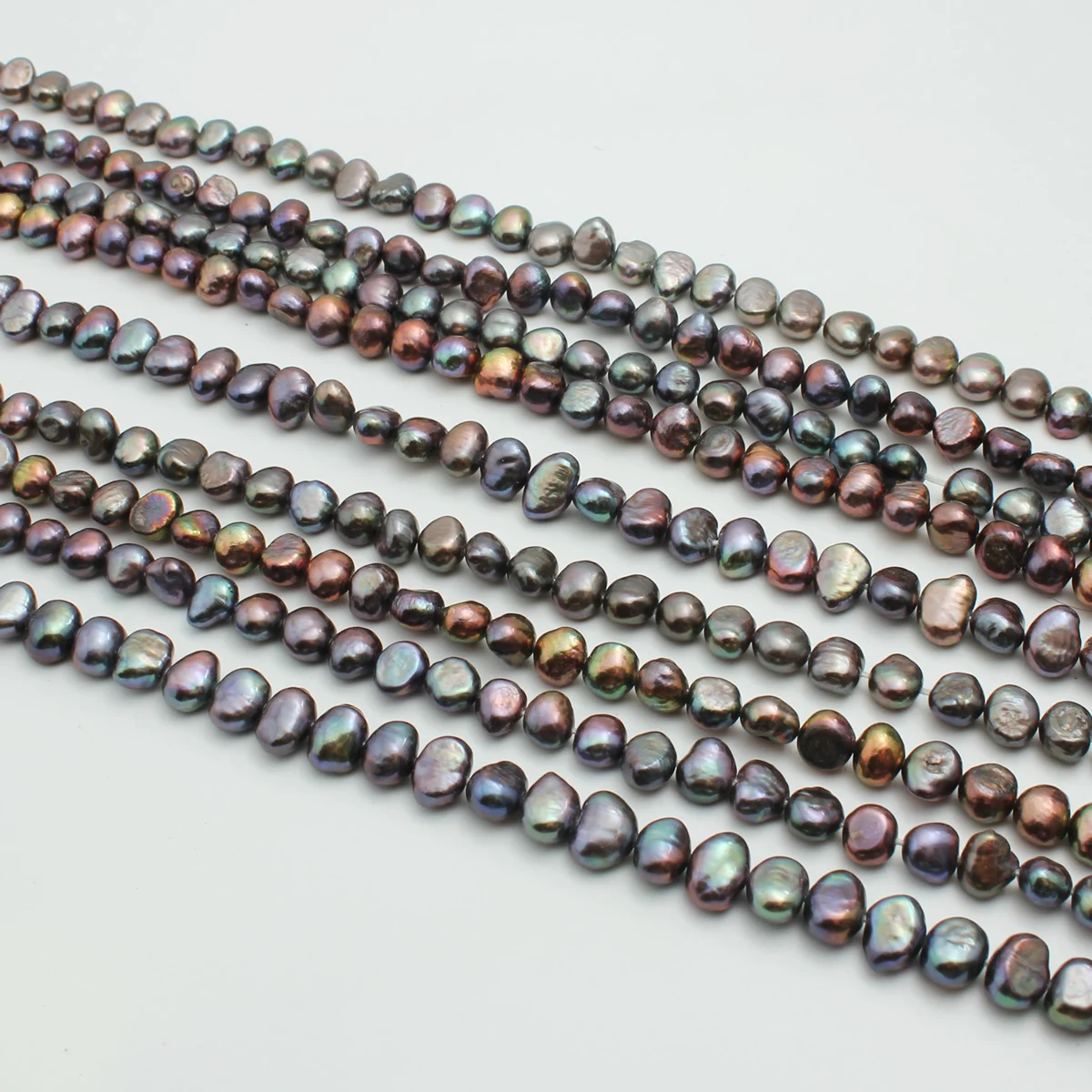 5-6mm natural freshwater pearl black natural light two-sided light beads are used to make jewelry DIY necklaces and bracelets
5-6mm natural freshwater pearl black natural light two-sided light beads are used to make jewelry DIY necklaces and bracelets