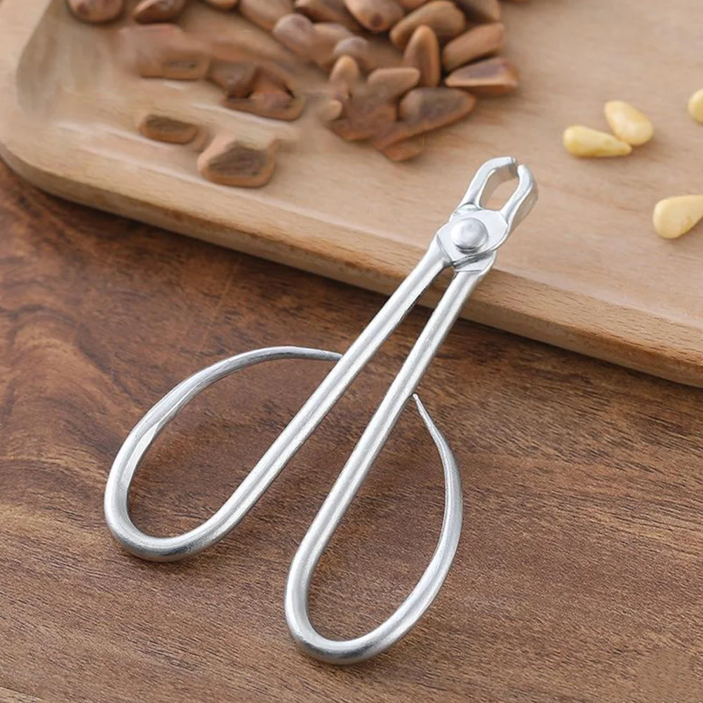 Useful Tool Pine Nut Clip Convenient Opener Metal Household Opening Multi-function Cracking
Useful Tool Pine Nut Clip Convenient Opener Metal Household Opening Multi-function Cracking