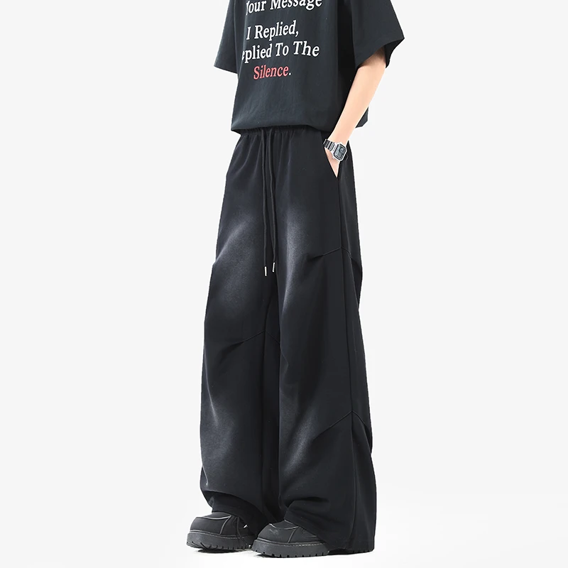 Simple Men's Sweatpants Solid Color Washing Drawstring Pleated Design Side Pocket Elastic Waist Loose Male Trousers
Simple Men's Sweatpants Solid Color Washing Drawstring Pleated Design Side Pocket Elastic Waist Loose Male Trousers