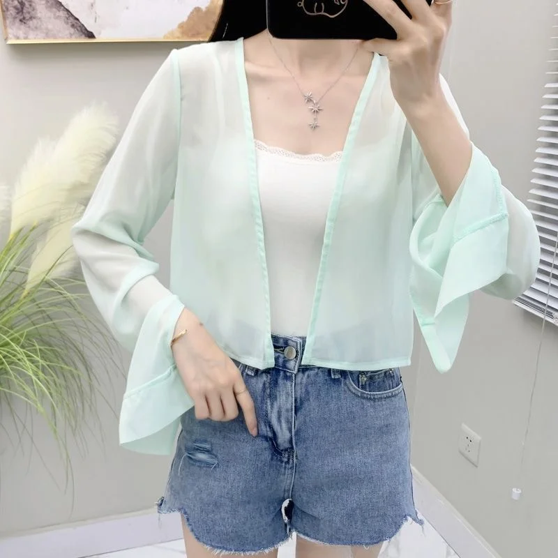 Женская летняя верхняя одежда: кардиган свободного кроя с защитой от солнца, универсальный, с открытым воротником, подходит под юбку
Женская летняя верхняя одежда: кардиган свободного кроя с защитой от солнца, универсальный, с открытым воротником, подходит под юбку