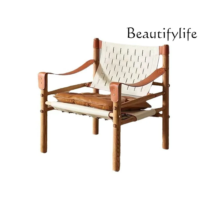 Nordic medieval saddle leather solid wood chair household simple single casual sofa chair
Nordic medieval saddle leather solid wood chair household simple single casual sofa chair