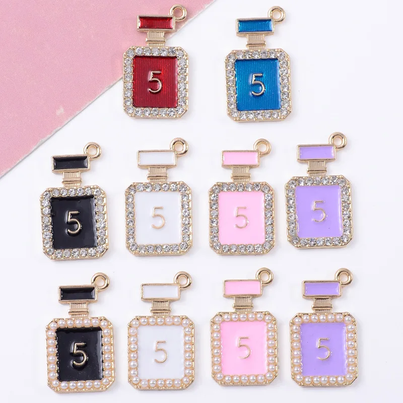 100Pcs sets fashion inlaid pearl white crystal digital 5 perfume bottle oil drip fit accessories DIY earrings earrings pendant
100Pcs sets fashion inlaid pearl white crystal digital 5 perfume bottle oil drip fit accessories DIY earrings earrings pendant