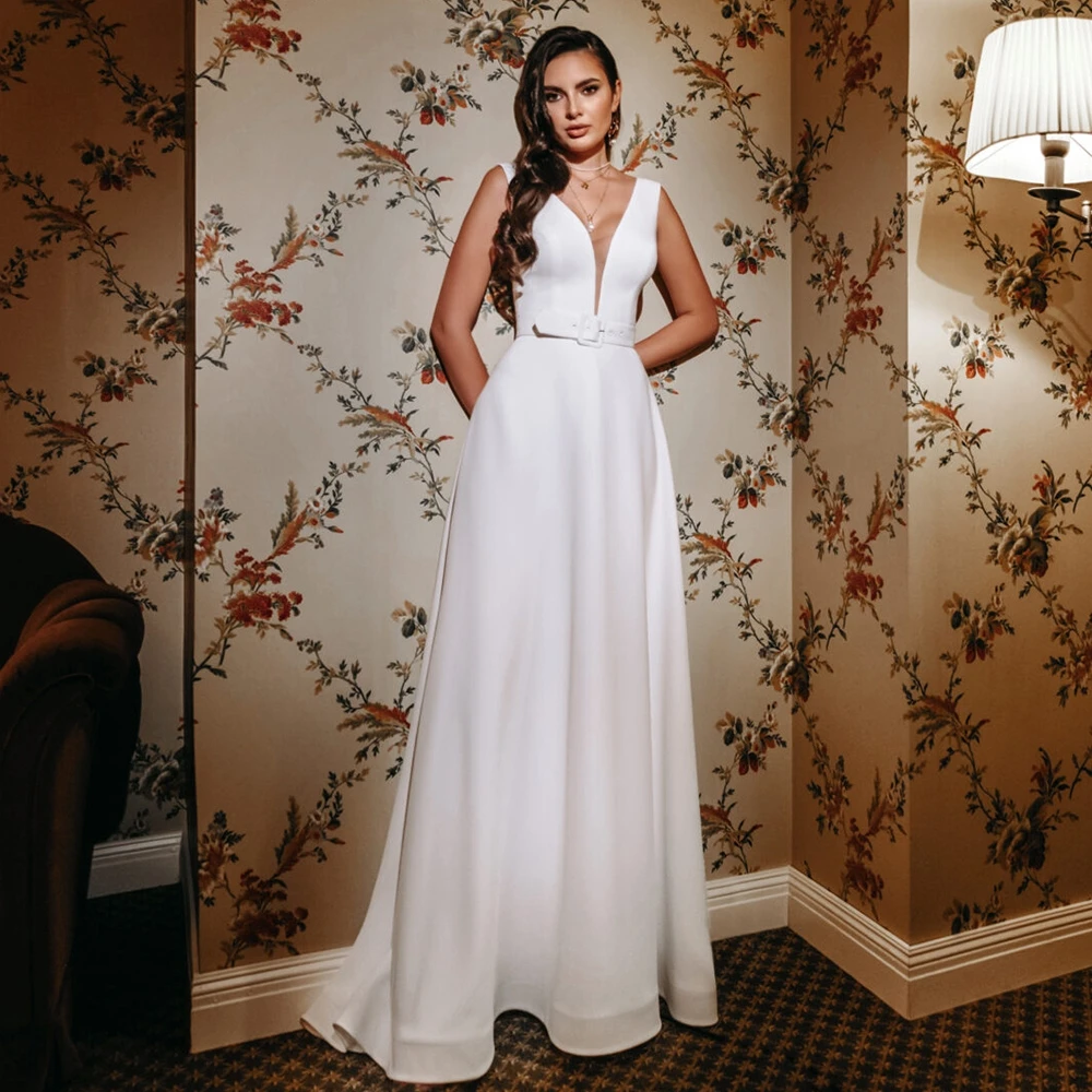 Simple White Wedding Dresses V-Neck with Belt Sleeveless A-Line Floor Length High Quality Bridal Marry Formal Gowns Robe
Simple White Wedding Dresses V-Neck with Belt Sleeveless A-Line Floor Length High Quality Bridal Marry Formal Gowns Robe