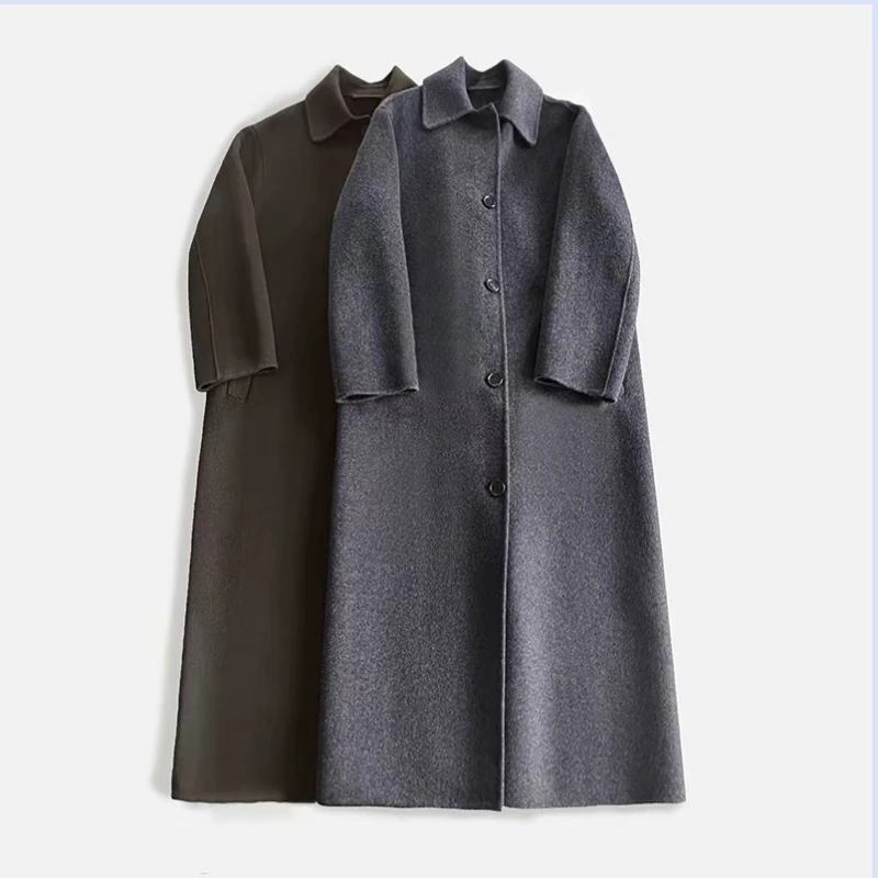 Autumn and winter European and American niche collar silhouette with back slit, medium length double-sided woolen coat jacket
Autumn and winter European and American niche collar silhouette with back slit, medium length double-sided woolen coat jacket