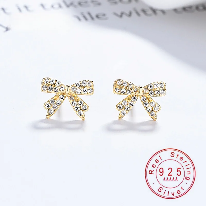 925 Sterling Silver Bow Stud Earrings, Cubic Zirconia Paved Tiny Bow Earrings for Women, Gold Plated Hypoallergenic
925 Sterling Silver Bow Stud Earrings, Cubic Zirconia Paved Tiny Bow Earrings for Women, Gold Plated Hypoallergenic