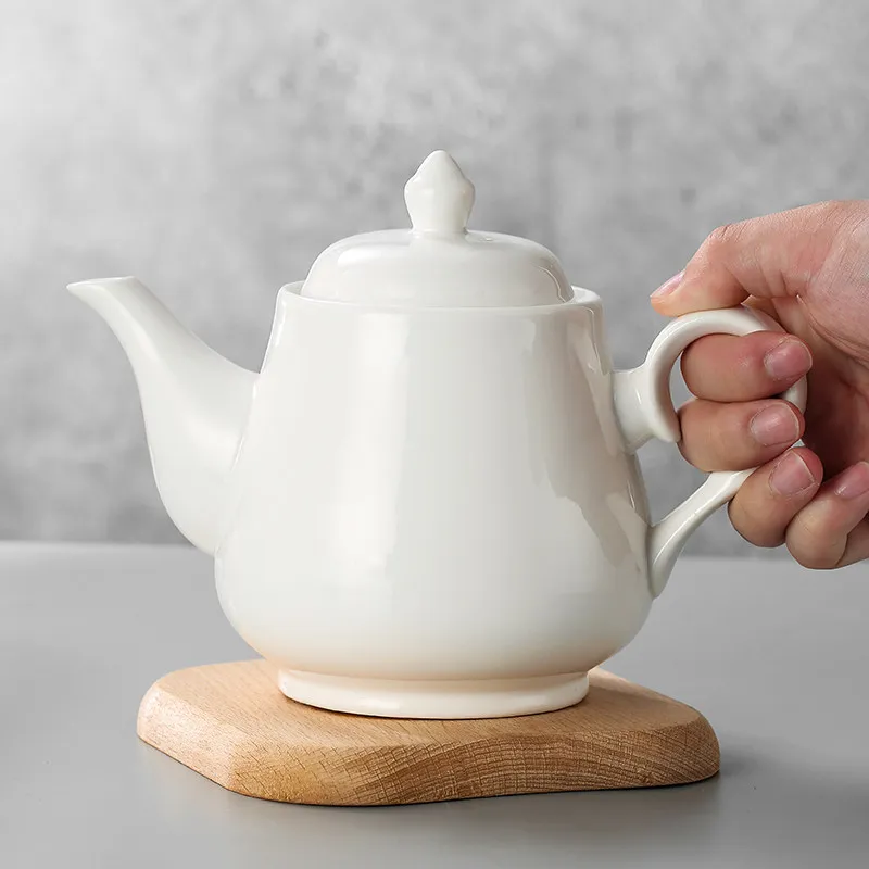 White Ceramic Teapot Chinese Style Porcelain Tea Pot Heat Resistant Hot Water Kettle Minimalist Coffee Pot Commercial Restaurant
White Ceramic Teapot Chinese Style Porcelain Tea Pot Heat Resistant Hot Water Kettle Minimalist Coffee Pot Commercial Restaurant