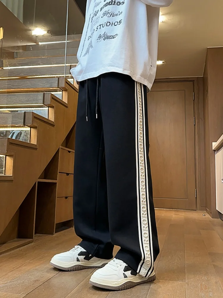 Trendy Splice Sports Pants for Men Loose Straight Leg Wide Leg Casual Long Trousers Spring New Arrival Faionable Brand
Trendy Splice Sports Pants for Men Loose Straight Leg Wide Leg Casual Long Trousers Spring New Arrival Faionable Brand