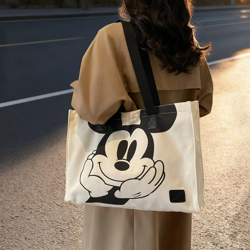 Women's New Cute Tote Travel storage bag Disney girl boy Large Capacity Handbag Mickey Mouse Canvas Shoulder Bag
Women's New Cute Tote Travel storage bag Disney girl boy Large Capacity Handbag Mickey Mouse Canvas Shoulder Bag