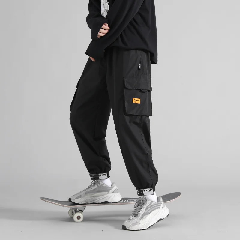Spring and Autumn Men's High Waist Solid Color Pockets Loose Tie Feet Work Cargo Pants Fashion Casual Work Classic Trousers
Spring and Autumn Men's High Waist Solid Color Pockets Loose Tie Feet Work Cargo Pants Fashion Casual Work Classic Trousers