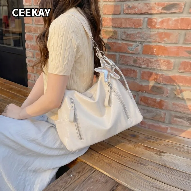 CEEKAY Solid White Shiny PU Oversized Shoulder Bag Dual Vertical Zipper Decor Soft Handle Adjustable Cross Strap Casual Handbag
CEEKAY Solid White Shiny PU Oversized Shoulder Bag Dual Vertical Zipper Decor Soft Handle Adjustable Cross Strap Casual Handbag