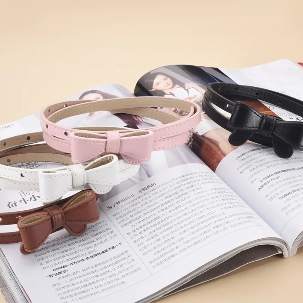 Новый кожаный ремень с бантом, однотонный регулируемый тонкий ремень, простая поясная цепочка для джинсов
Новый кожаный ремень с бантом, однотонный регулируемый тонкий ремень, простая поясная цепочка для джинсов