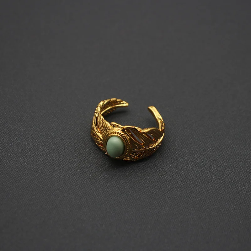 European and American Women's New Vintage Feather Turquoise Adjustable Ring Copper Gold-plated Letter Earrings
European and American Women's New Vintage Feather Turquoise Adjustable Ring Copper Gold-plated Letter Earrings