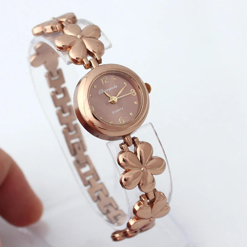 Women Flower Bracelet Watches Luxury Wristwatches Dress Watch Fashion Casual Vintage Ladies Watch o110
Women Flower Bracelet Watches Luxury Wristwatches Dress Watch Fashion Casual Vintage Ladies Watch o110
