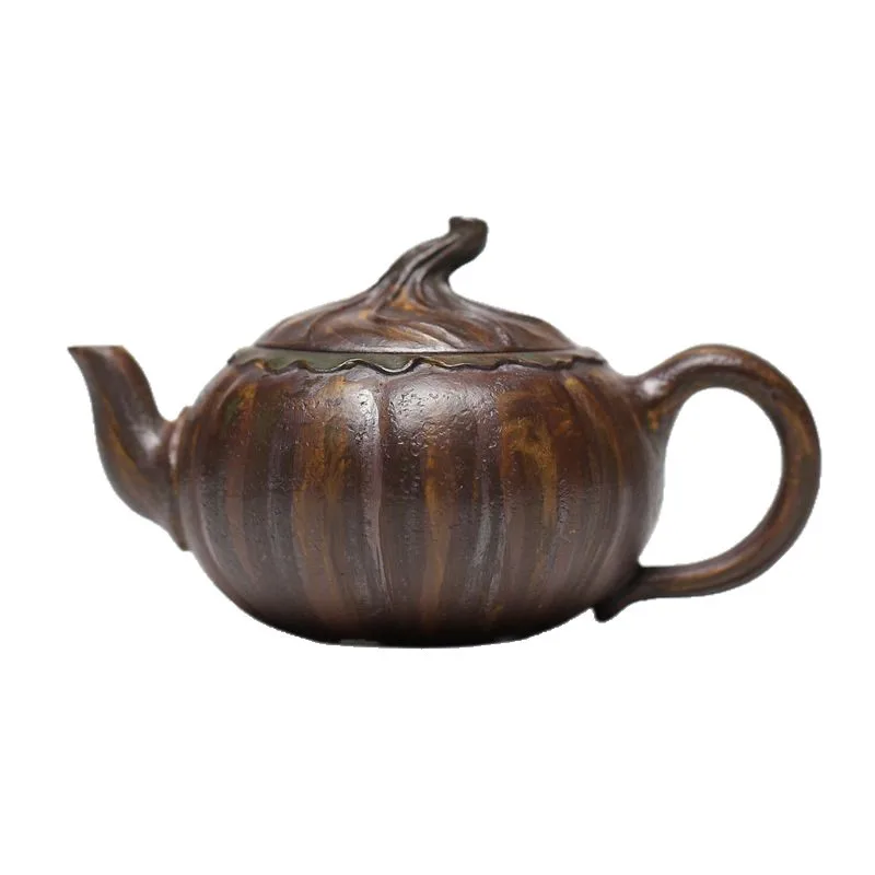 Zisha pot raw ore purple mud handmade bionic flower ware pumpkin teapot kung fu tea set
Zisha pot raw ore purple mud handmade bionic flower ware pumpkin teapot kung fu tea set