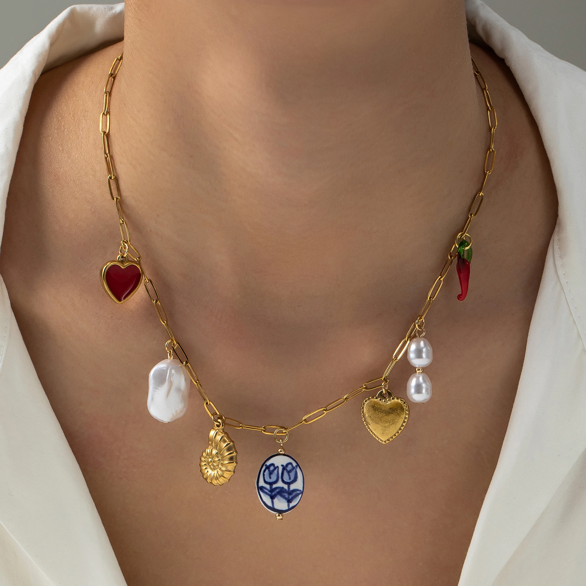 Stainless steel conch ocean style heart-shaped collarbone necklace with gold plating and color preservation for women as a gift
Stainless steel conch ocean style heart-shaped collarbone necklace with gold plating and color preservation for women as a gift