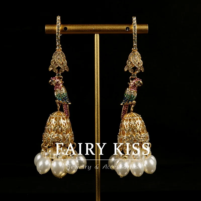 Vintage long pearl tassel pendants hollowed cage parrot diamonds 925 silver needle stud earrings
Vintage long pearl tassel pendants hollowed cage parrot diamonds 925 silver needle stud earrings