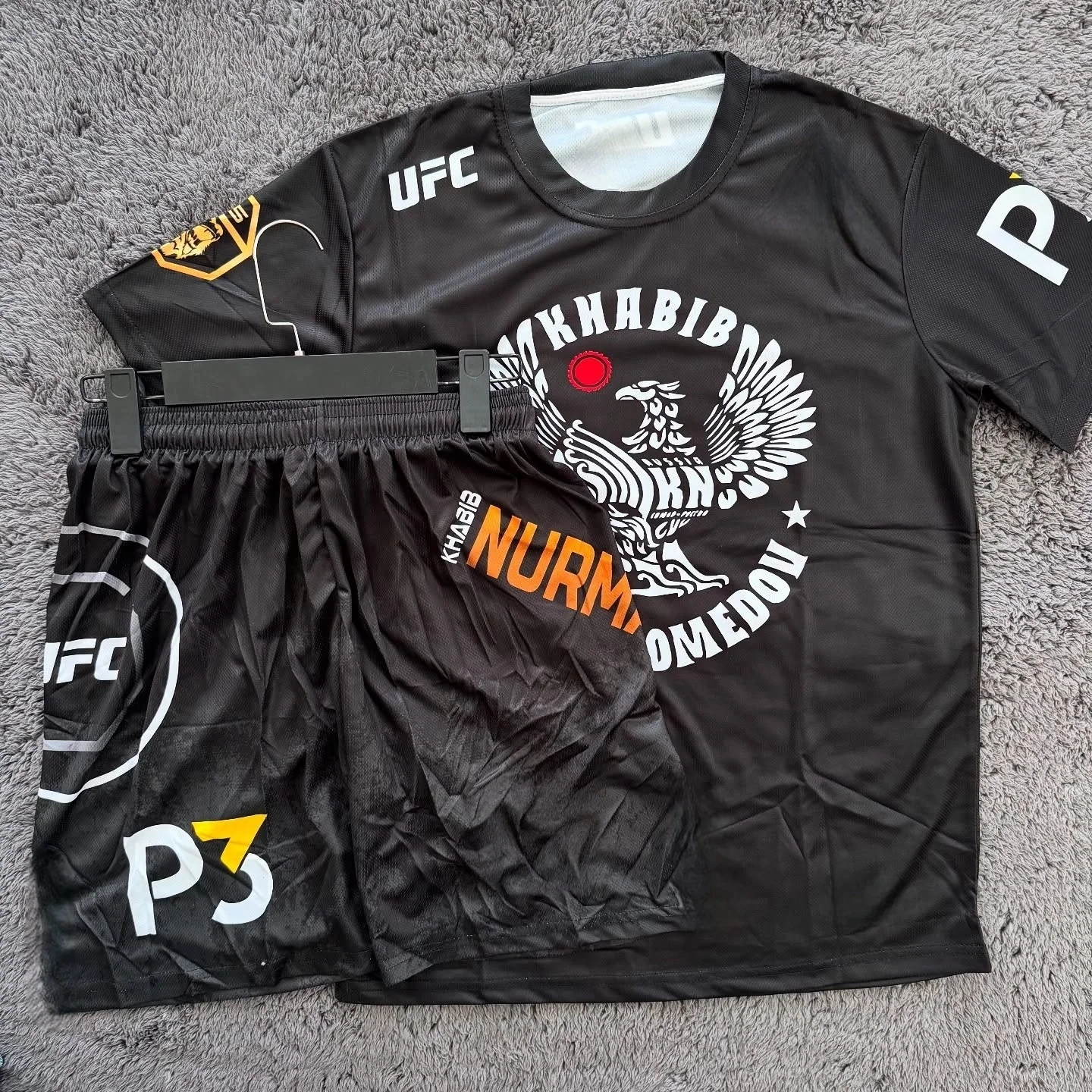 Комплект для тренировок UFC 229: футболка и шорты для мужчин, быстросохнущие, для единоборств, борьбы, джиу-джитсу, бега
Комплект для тренировок UFC 229: футболка и шорты для мужчин, быстросохнущие, для единоборств, борьбы, джиу-джитсу, бега