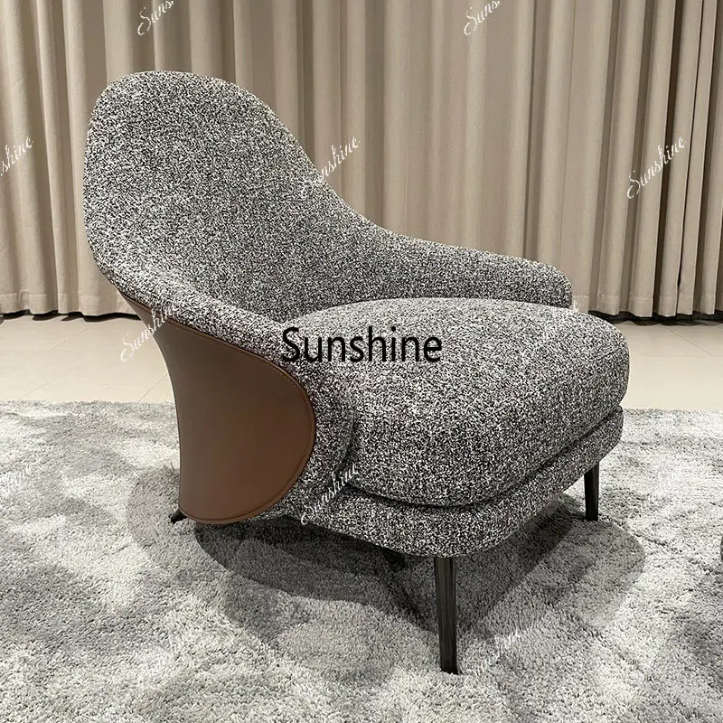 Italian minimalist sofa chair, light luxury negotiation chair, light luxury fabric leisure chair
Italian minimalist sofa chair, light luxury negotiation chair, light luxury fabric leisure chair