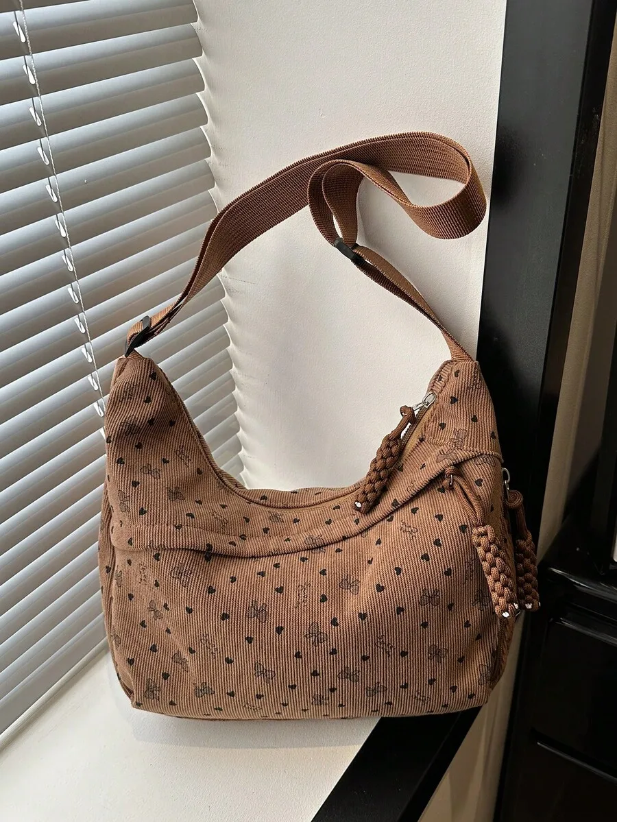 Brown Corduroy Hobo Bag With Heart Pattern, Spacious Shoulder Tote For Office And Casual Use
Brown Corduroy Hobo Bag With Heart Pattern, Spacious Shoulder Tote For Office And Casual Use
