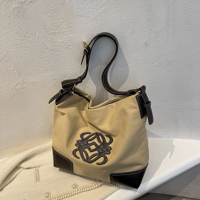 2025 Trendy Women's Canvas Bucket Shoulder Bag By Luxury Label - Super Versatile, Ideal for All - Day Casual Use,
2025 Trendy Women's Canvas Bucket Shoulder Bag By Luxury Label - Super Versatile, Ideal for All - Day Casual Use,