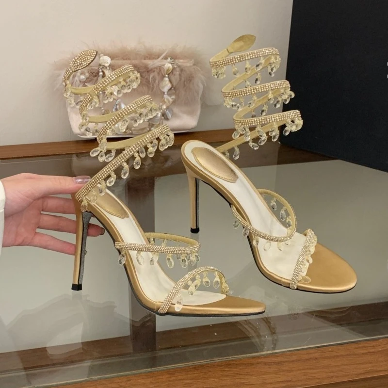 New Serpentine Wound Rhinestone Fringed High-heeled Sandals Women's Stiletto Crystal Shoes Wedding Shoes
New Serpentine Wound Rhinestone Fringed High-heeled Sandals Women's Stiletto Crystal Shoes Wedding Shoes
