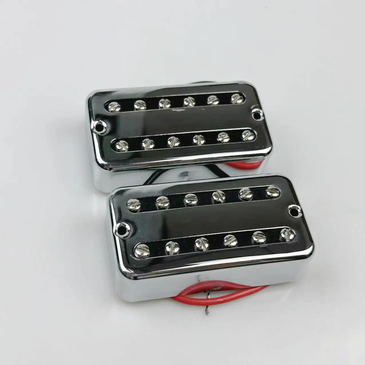 Chrome FilterTron Style Guitar Pickups Set - Vintage Sound Hand Wired for That Classic Tone
Chrome FilterTron Style Guitar Pickups Set - Vintage Sound Hand Wired for That Classic Tone