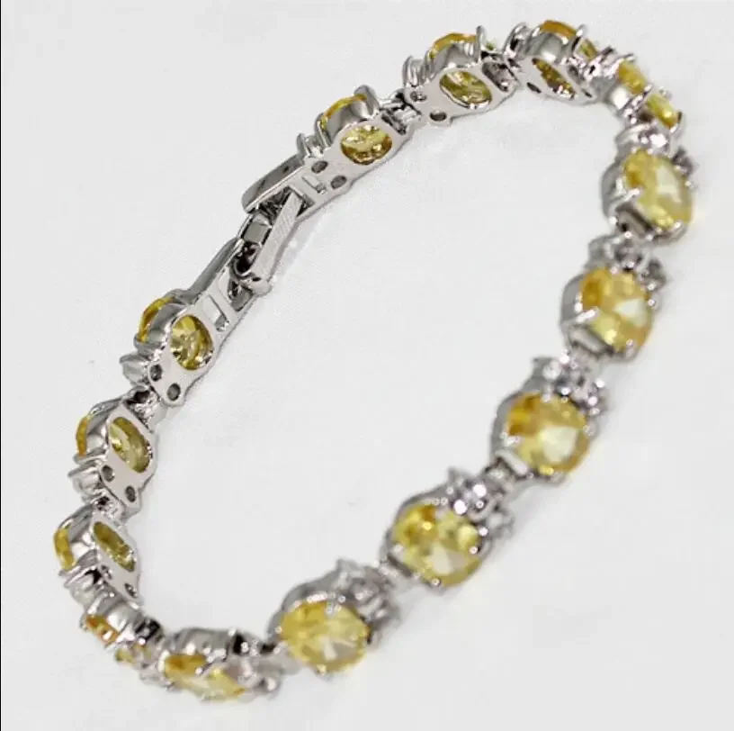 Женский модный посеребренный круглый браслет с желтым цирконом 
Женский модный посеребренный круглый браслет с желтым цирконом