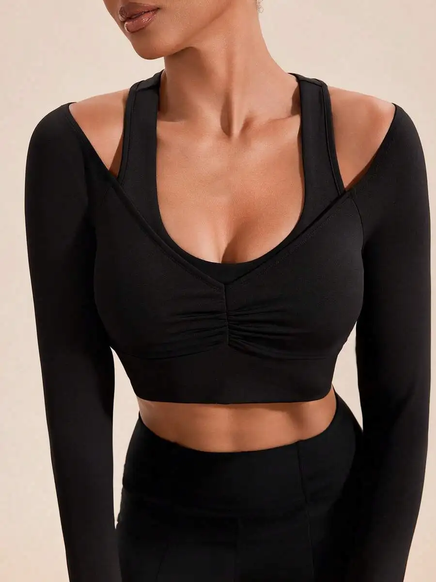 Womens Solid Black Long Sleeve Fitted Sports Crop Top With Ruching Detail
Womens Solid Black Long Sleeve Fitted Sports Crop Top With Ruching Detail