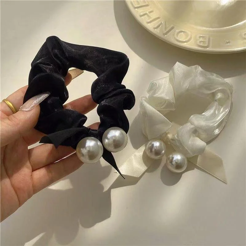 Bow tie pearl headband hair accessories high-end feel women's tie balls scalp muscles temperament hair rope
Bow tie pearl headband hair accessories high-end feel women's tie balls scalp muscles temperament hair rope