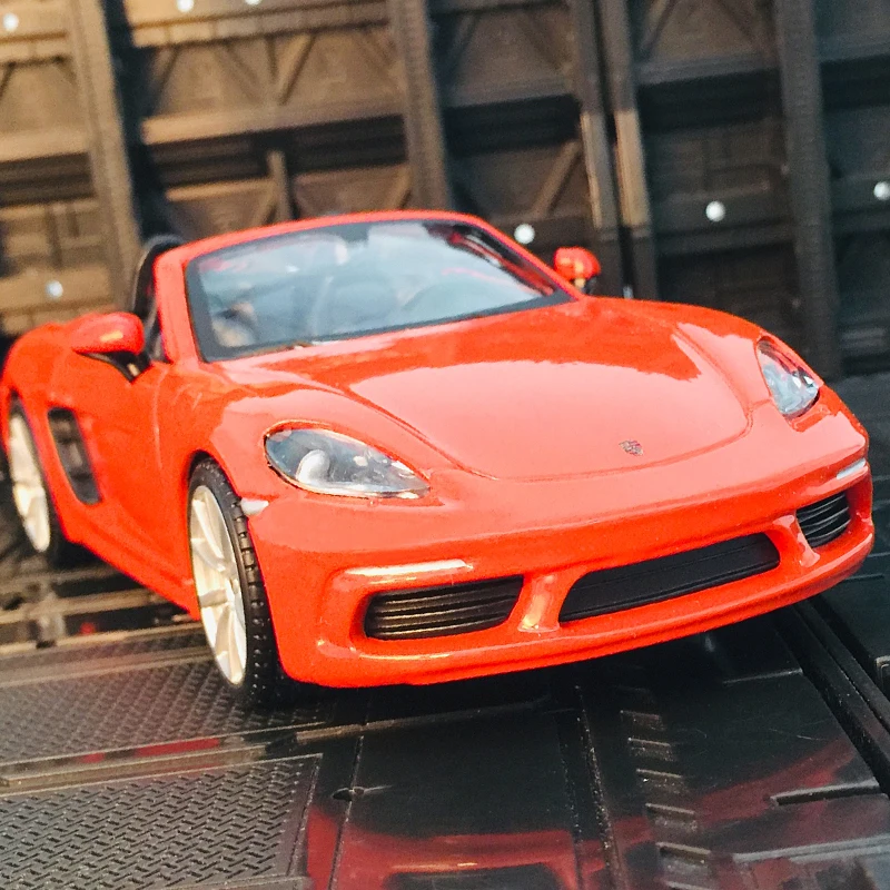 Bburago 1:24 Porsche 718 alloy car model static ornaments front wheel steering linkage toy door can be opened
Bburago 1:24 Porsche 718 alloy car model static ornaments front wheel steering linkage toy door can be opened