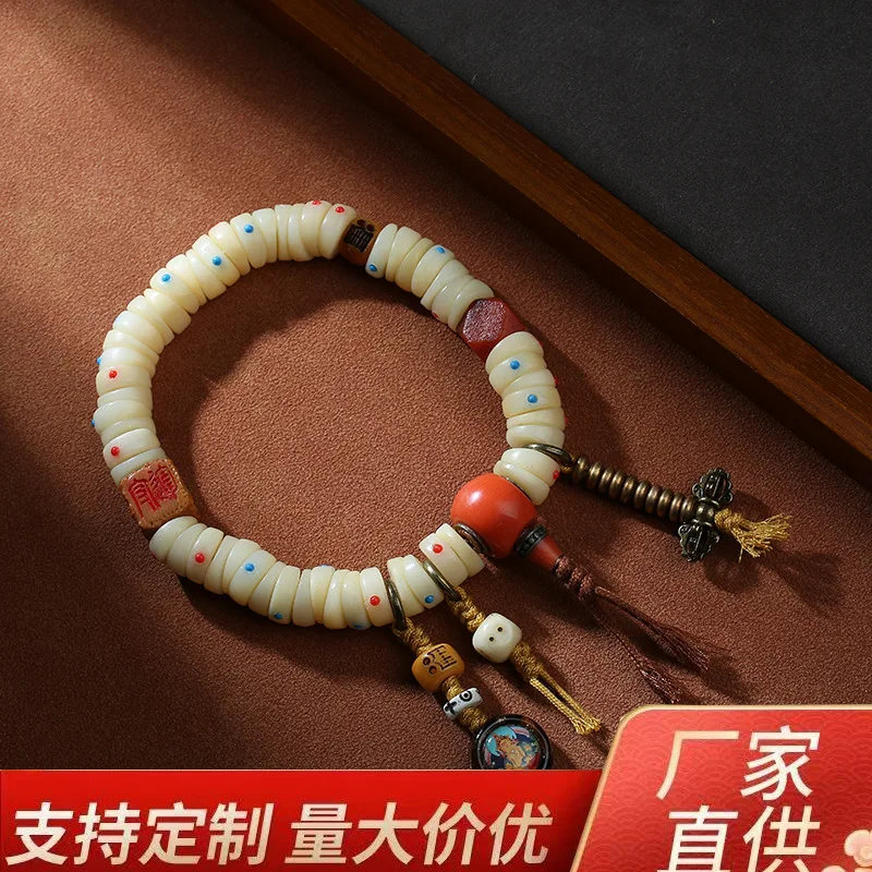 Tibetan-style bone inlaid with agate stone, copper pestle subduing demons, multi-ring hand-held piece of Yellow
Tibetan-style bone inlaid with agate stone, copper pestle subduing demons, multi-ring hand-held piece of Yellow