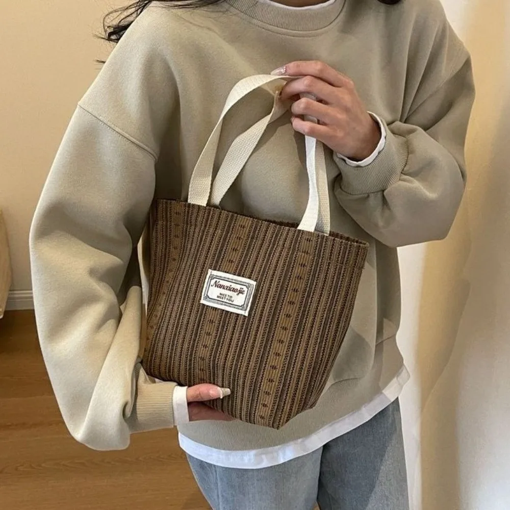 New Versatile Canvas Bag Large Capacity Durable Striped Tote Bag Lightweight Handheld Bag Commuting
New Versatile Canvas Bag Large Capacity Durable Striped Tote Bag Lightweight Handheld Bag Commuting