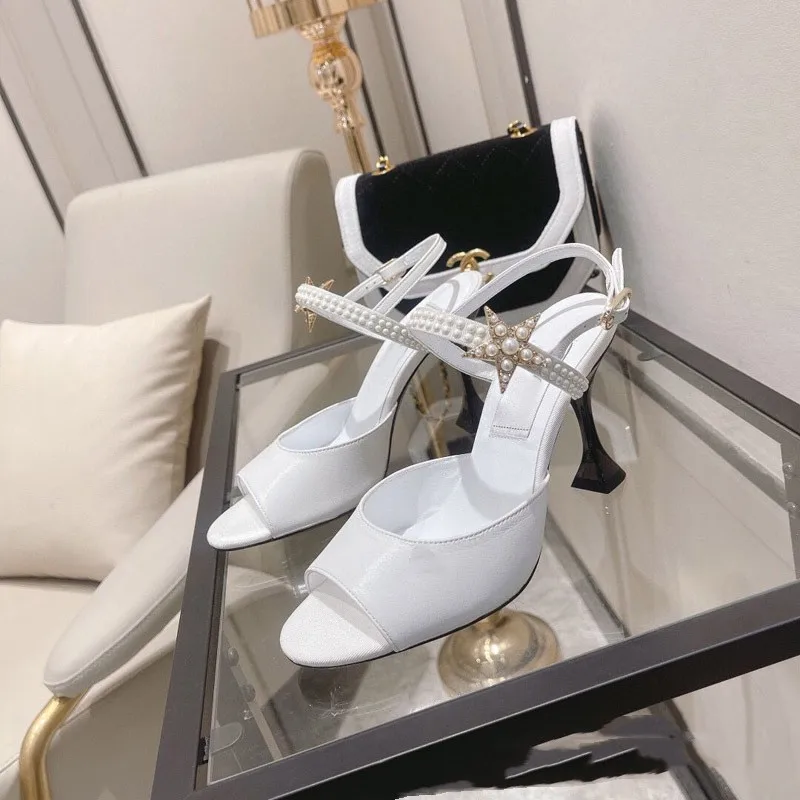 2023 Summer New Fish Mouth Open Toe Water Diamond Pearl One Line Sandals Thin High Heels Banquet Dress Versatile Women's Shoes
2023 Summer New Fish Mouth Open Toe Water Diamond Pearl One Line Sandals Thin High Heels Banquet Dress Versatile Women's Shoes