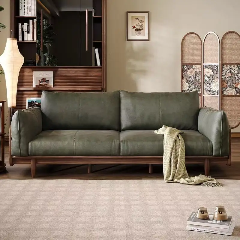 Italian light luxury solid wood sofa living room genuine leather black walnut sofa
Italian light luxury solid wood sofa living room genuine leather black walnut sofa