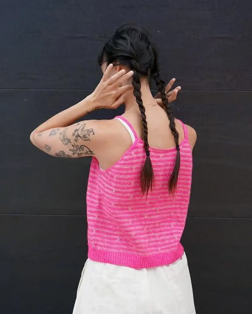Sweet and spicy girl style knitted camisole vest for women in summer, worn on the outside and short on the inside
Sweet and spicy girl style knitted camisole vest for women in summer, worn on the outside and short on the inside