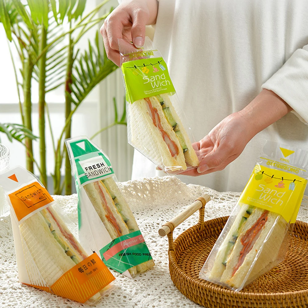 100 шт., утолщенная треугольная сумка-сэндвич, прозрачные треугольные сумки для хлеба, сумки для украшения дня рождения, вечеринки
100 шт., утолщенная треугольная сумка-сэндвич, прозрачные треугольные сумки для хлеба, сумки для украшения дня рождения, вечеринки