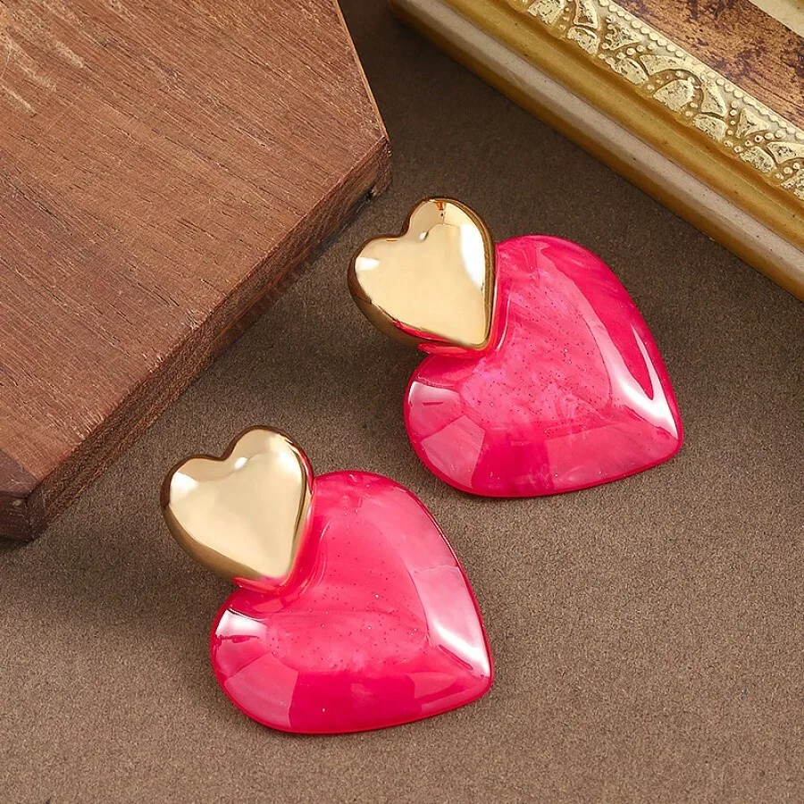 2PCS Fashion Heart Shape Acrylic Earrings With Gold Tone Accent
2PCS Fashion Heart Shape Acrylic Earrings With Gold Tone Accent