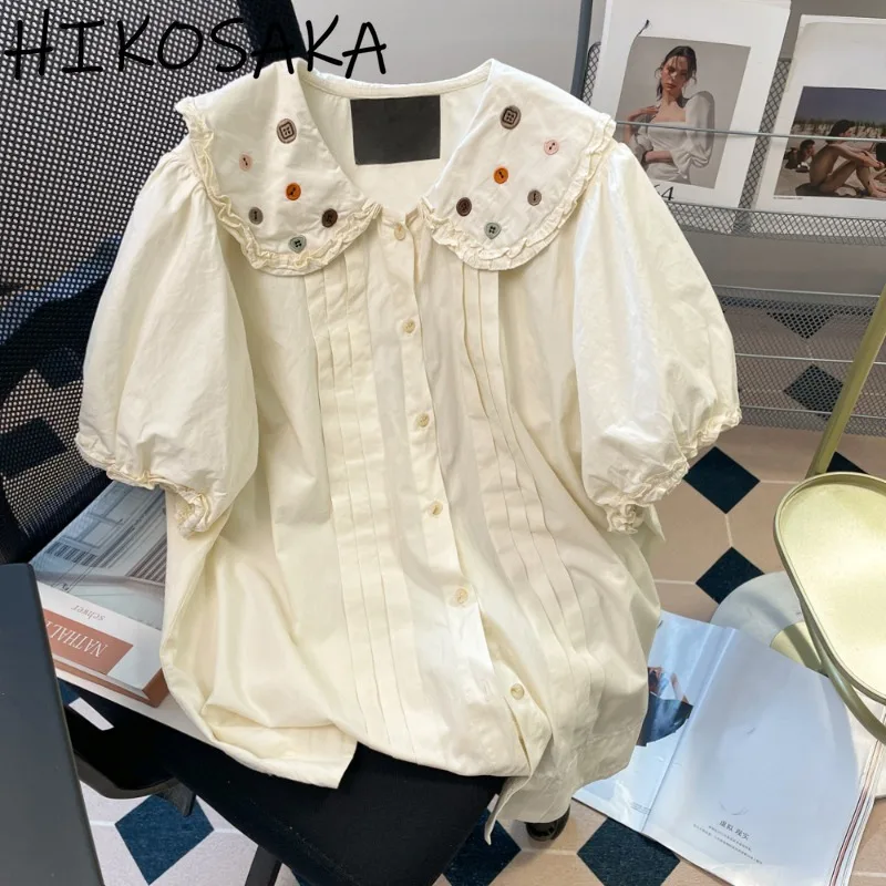 French Temperament Embroidery Peter Pan Collar Shirts Summer Chic Sweet Puff Short Sleeve Blouse Pleated Single Breasted Blusa
French Temperament Embroidery Peter Pan Collar Shirts Summer Chic Sweet Puff Short Sleeve Blouse Pleated Single Breasted Blusa