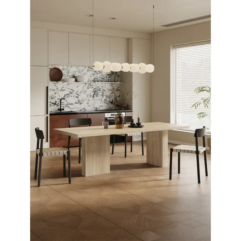 Travertine rock slab dining table and chairs, household small apartment dining table
Travertine rock slab dining table and chairs, household small apartment dining table