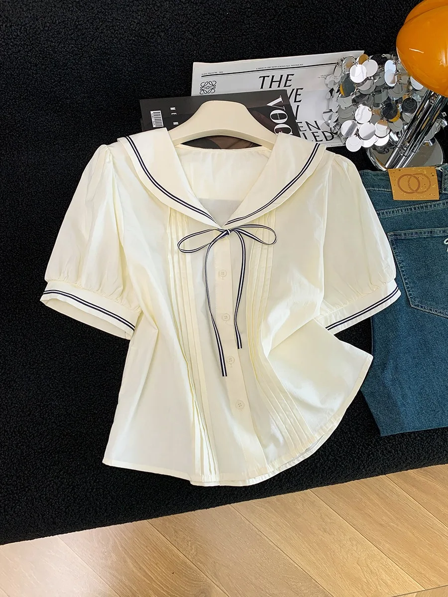 Summer New Style Navy Collar Short Sleeve Pleated Bubble Sleeve Shirt Women's Fashion Knot Tie Top Light Peach Color
Summer New Style Navy Collar Short Sleeve Pleated Bubble Sleeve Shirt Women's Fashion Knot Tie Top Light Peach Color