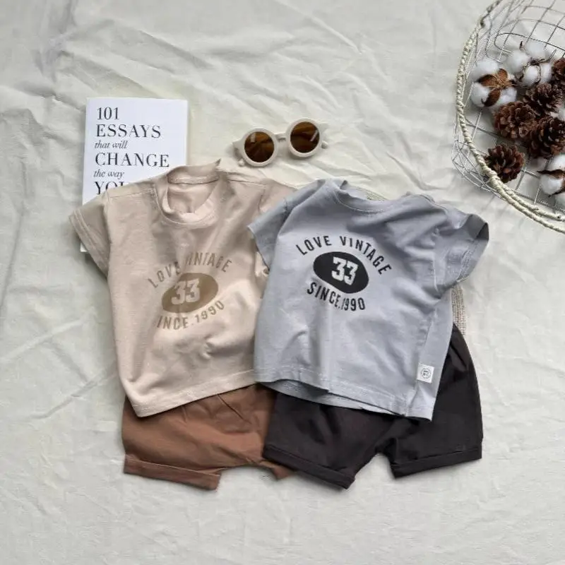 2025 Summer New Baby Short Sleeve Clothes Set Boy Girl Letter T Shirts + Shorts 2pcs Suit Infant Toddler Cotton Casual Outfits
2025 Summer New Baby Short Sleeve Clothes Set Boy Girl Letter T Shirts + Shorts 2pcs Suit Infant Toddler Cotton Casual Outfits