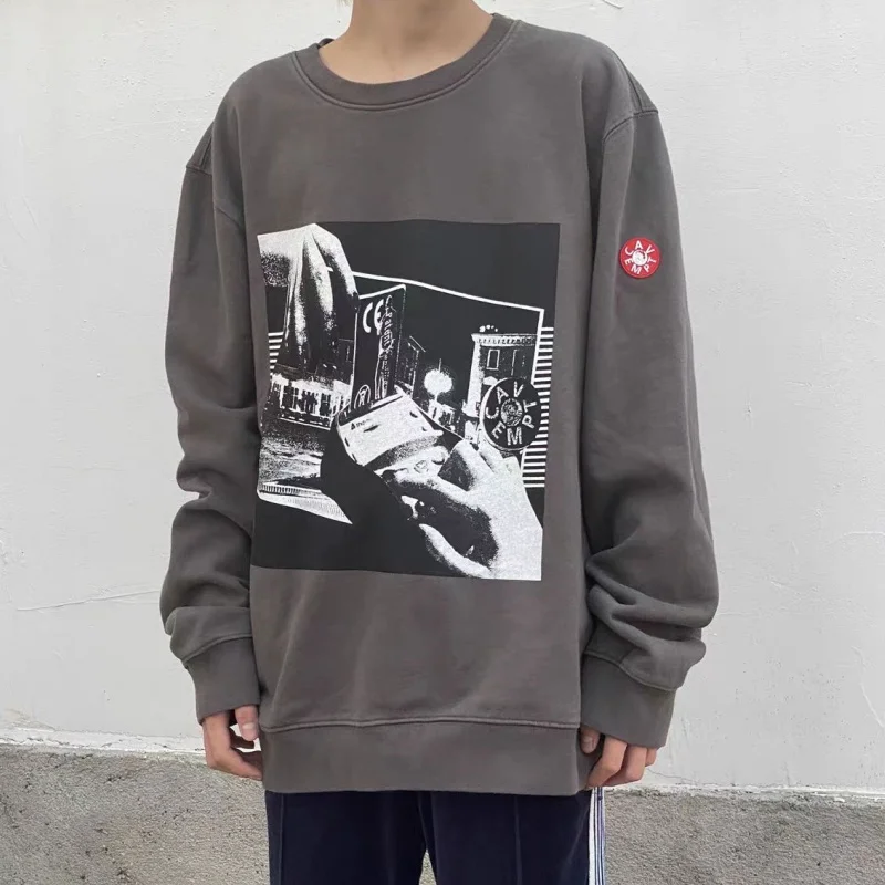 Retro Washed Pullover Cavempt Sweatshirt Men Women Featuring Card Print Round Neck C.E Long Sleeved Jacket
Retro Washed Pullover Cavempt Sweatshirt Men Women Featuring Card Print Round Neck C.E Long Sleeved Jacket