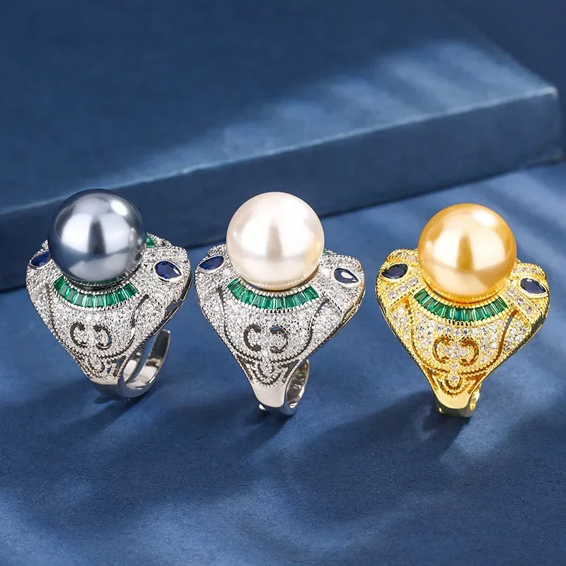 Adjustable Vintage Inspired White Gold Pearl Rings Embellished with Green Emeralds Blue Sapphires for Women's Fashion Jewelry
Adjustable Vintage Inspired White Gold Pearl Rings Embellished with Green Emeralds Blue Sapphires for Women's Fashion Jewelry