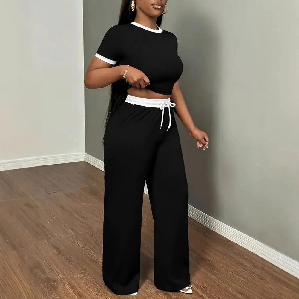 Round Neck Short Sleeve Top Trousers Set Stylish Women's Summer Crop Top Wide Leg Pants Set Casual Lounge Tracksuit for Women
Round Neck Short Sleeve Top Trousers Set Stylish Women's Summer Crop Top Wide Leg Pants Set Casual Lounge Tracksuit for Women
