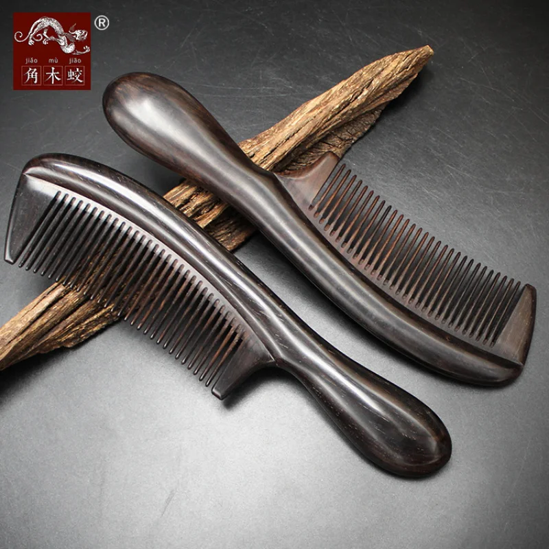 Ebony black sandalwood comb with fine teeth, handle and curved edges
Ebony black sandalwood comb with fine teeth, handle and curved edges