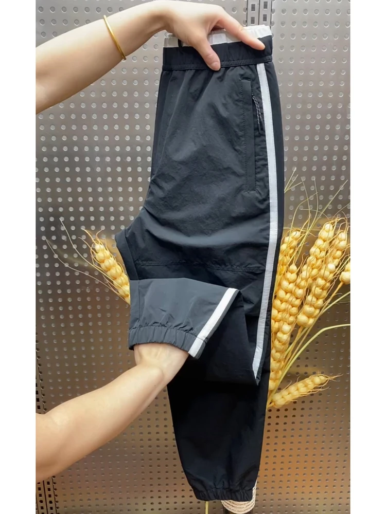 High-End Qui-Dry Spor Men's Casual Pants Loose Harem Sle Side Stripe Design Versatile Summer New Arrivals Faionable U...
High-End Qui-Dry Spor Men's Casual Pants Loose Harem Sle Side Stripe Design Versatile Summer New Arrivals Faionable U...