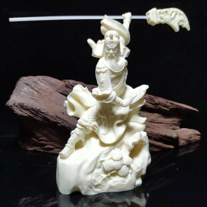Tagua Nut Vegetable Carved Dragon on Calabash Guangong Statue Decor
Tagua Nut Vegetable Carved Dragon on Calabash Guangong Statue Decor
