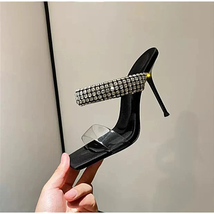 European and American New Black High-Heeled Rhinestone Sandals with A Straight Transparent Strap, Slim Heel and Square Toe
European and American New Black High-Heeled Rhinestone Sandals with A Straight Transparent Strap, Slim Heel and Square Toe