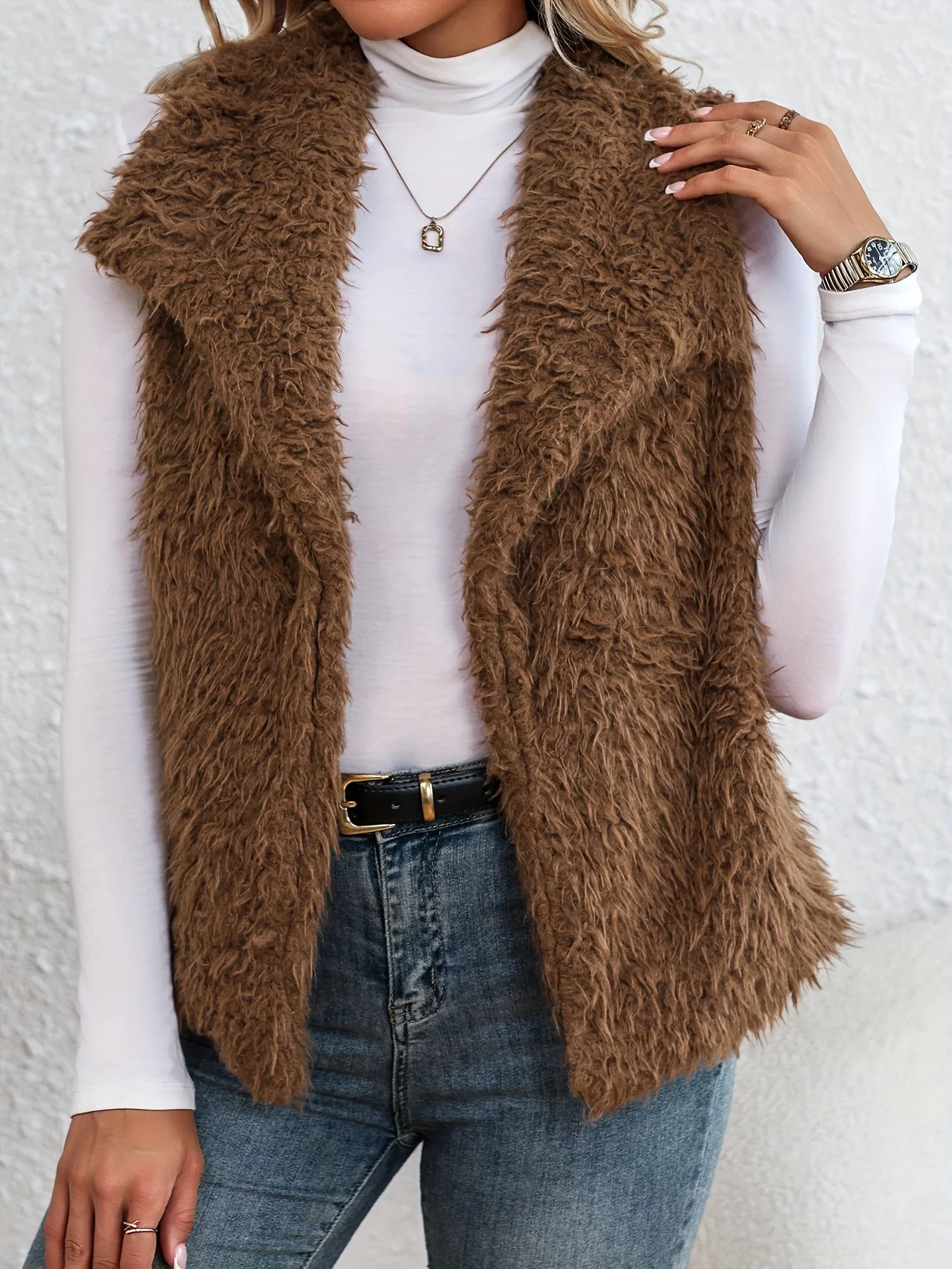A new versatile vest coat for women in autumn and winter, with a waterfall collar and a front opening plush vest
A new versatile vest coat for women in autumn and winter, with a waterfall collar and a front opening plush vest